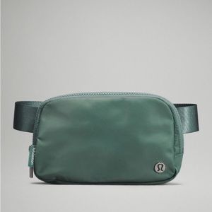 NWT Lululemon Everywhere Belt Bag 1L 
DESIGNED FOR ON THE MOVE in tidewater teal